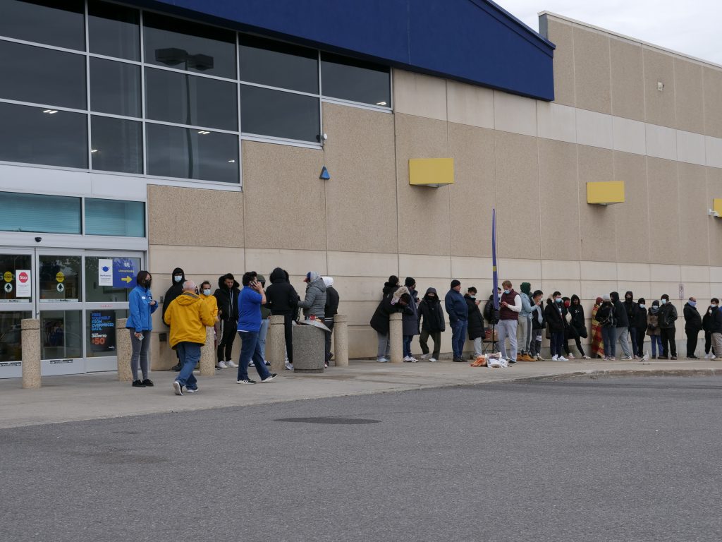 People line up outside Best Buy